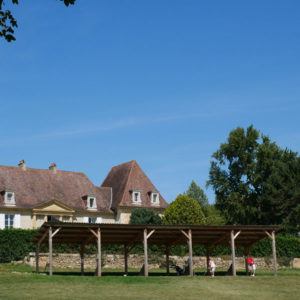 view of hotel les merles from the driving range